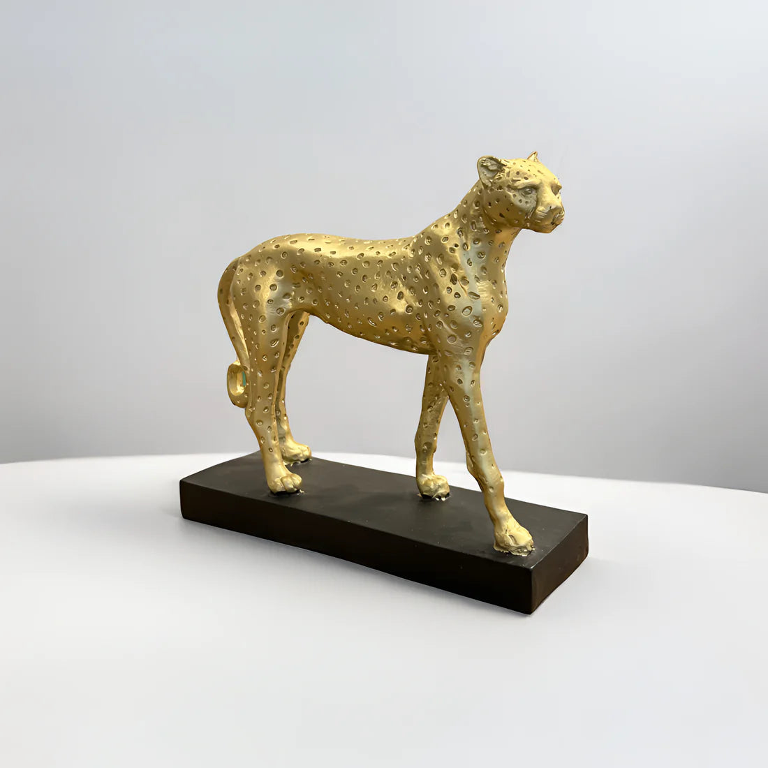 Home Studio | White Cheetah Sculpture with Golden Base | Modern Luxe Decor